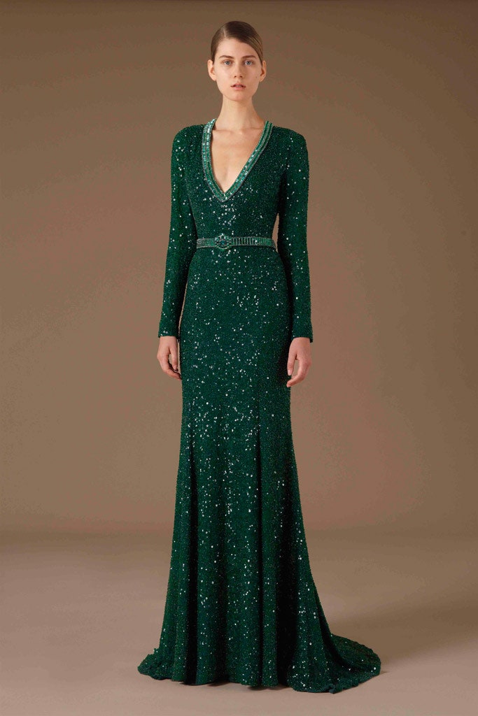 green sequined long-sleeve gown