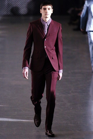 maroon tailored suit with checked shirt