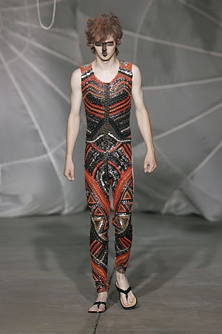 red and black sequined catsuit