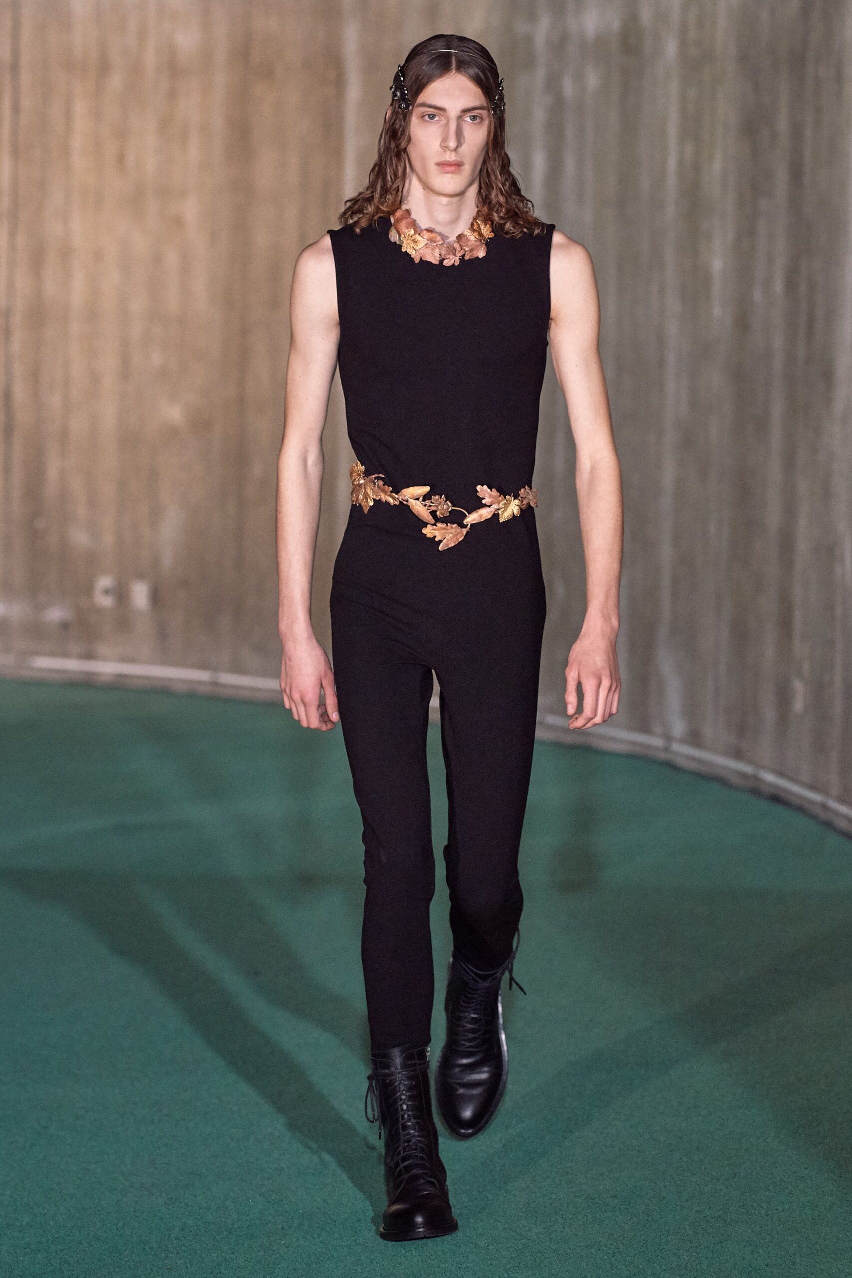 black fitted sleeveless catsuit