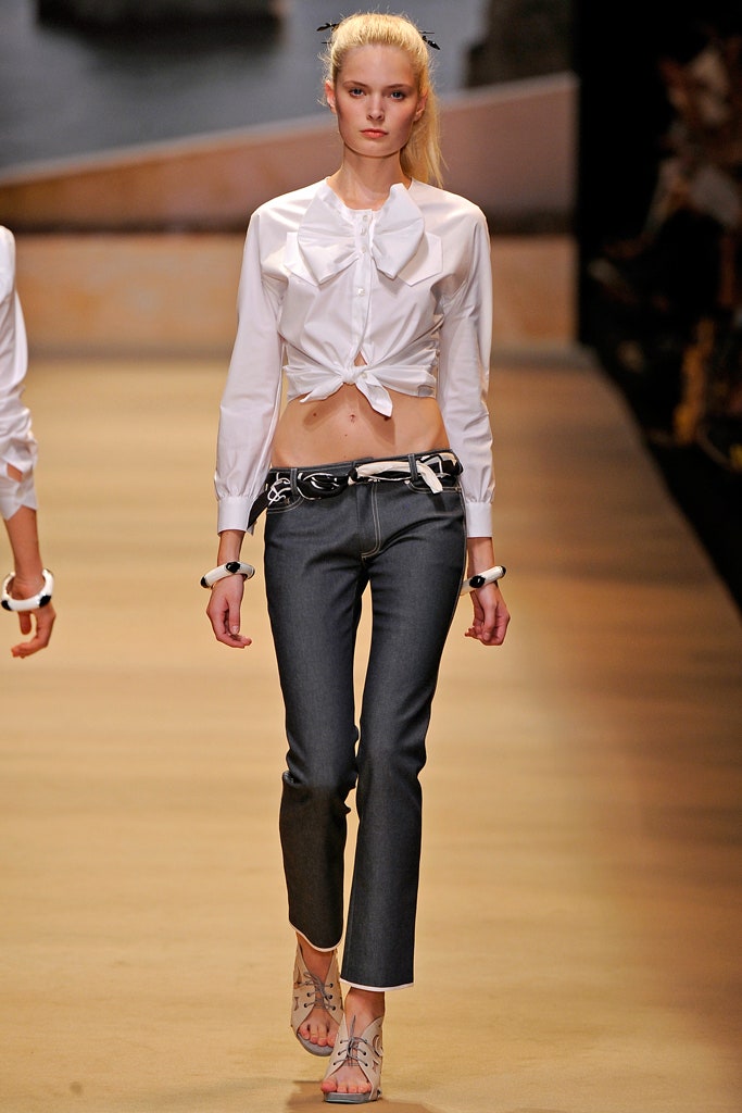 fitted white shirt and blue jeans