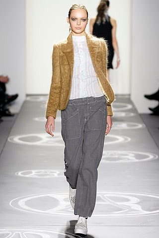 brown wool fitted jacket with white blouse