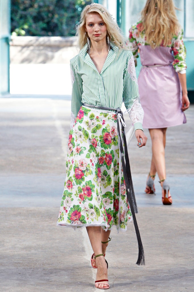 green striped shirt and floral skirt