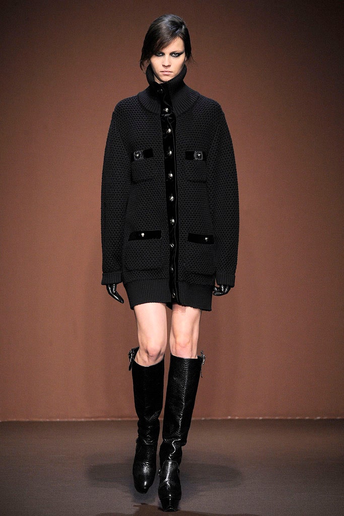 black wool long-sleeve collared relaxed buttoned pockets coat