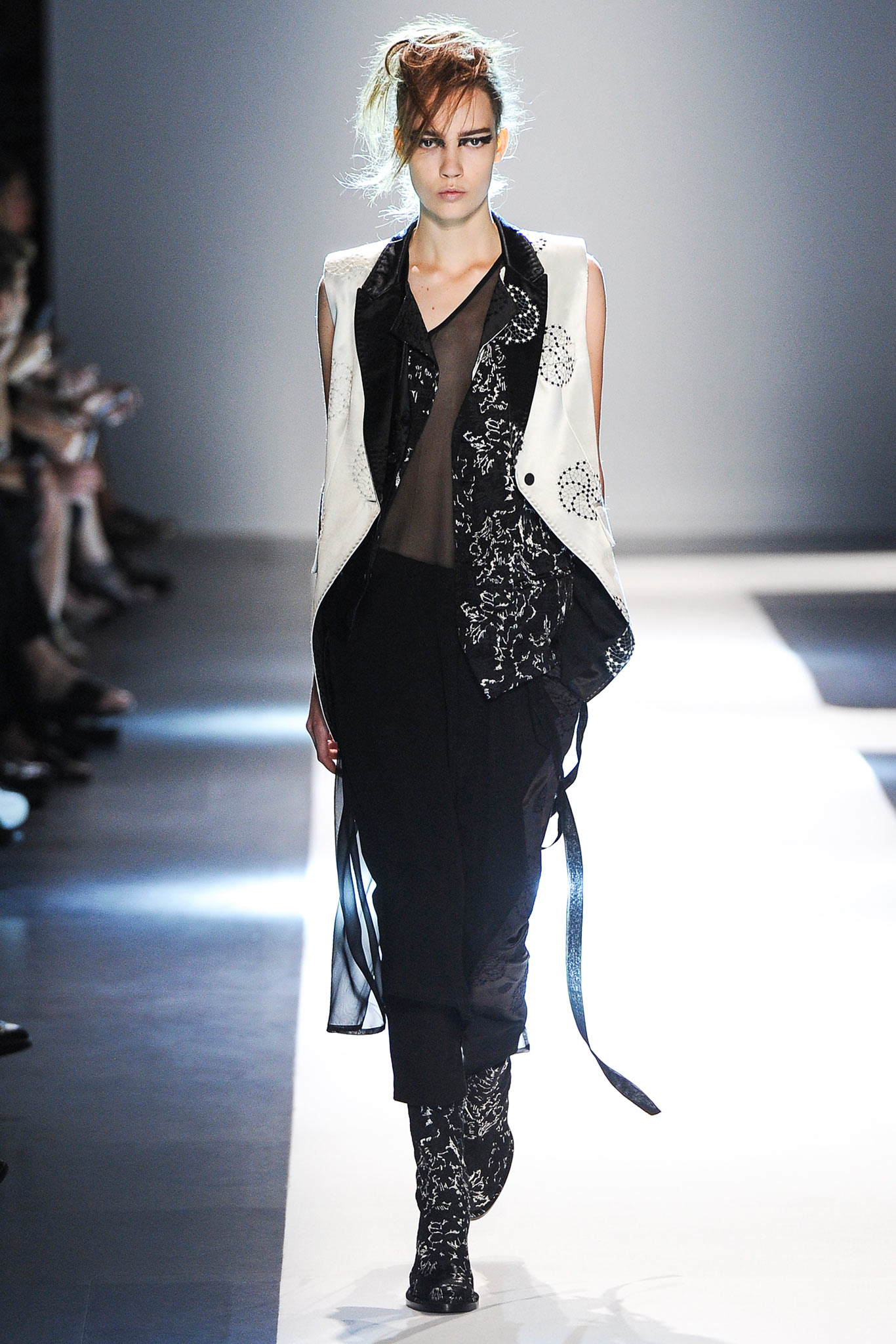 black and white fitted vest with sheer top