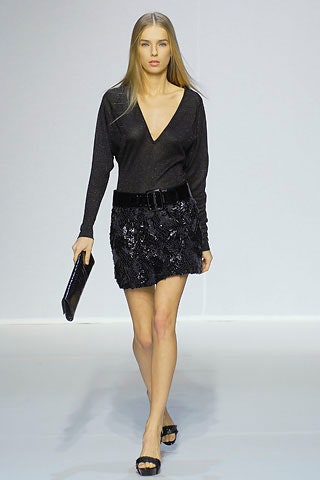 black silk fitted top and mini skirt