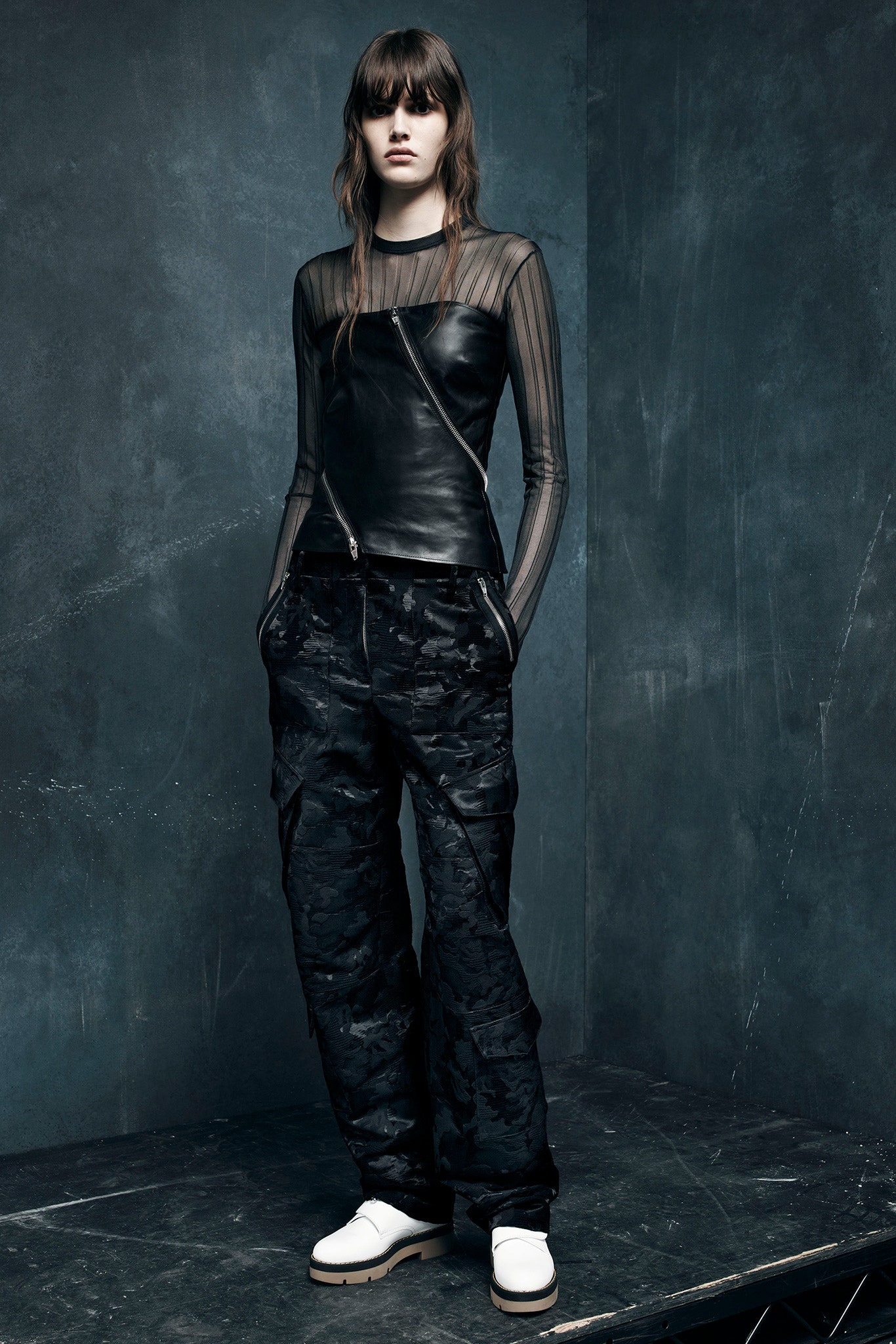 black leather fitted top with cargo pants