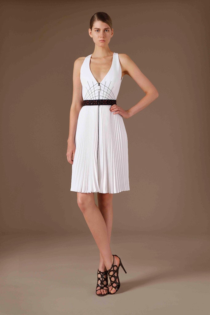 white pleated sleeveless dress
