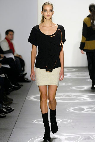 black fitted top beige mini skirt