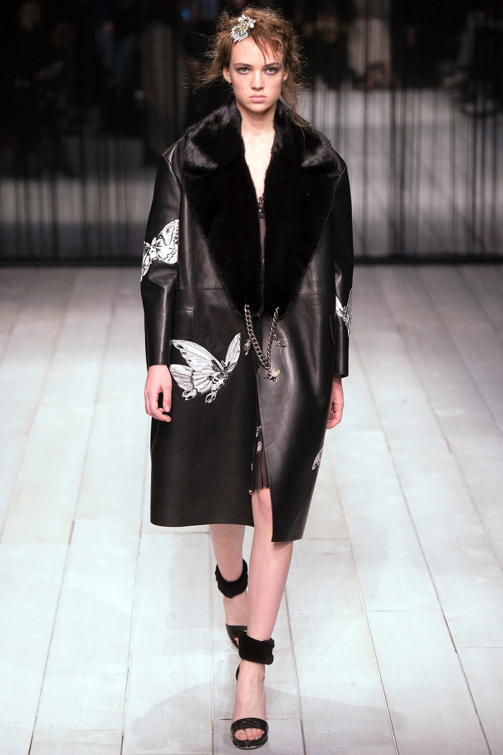 black leather coat with embroidered details