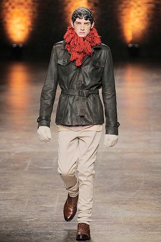 black leather jacket with red scarf