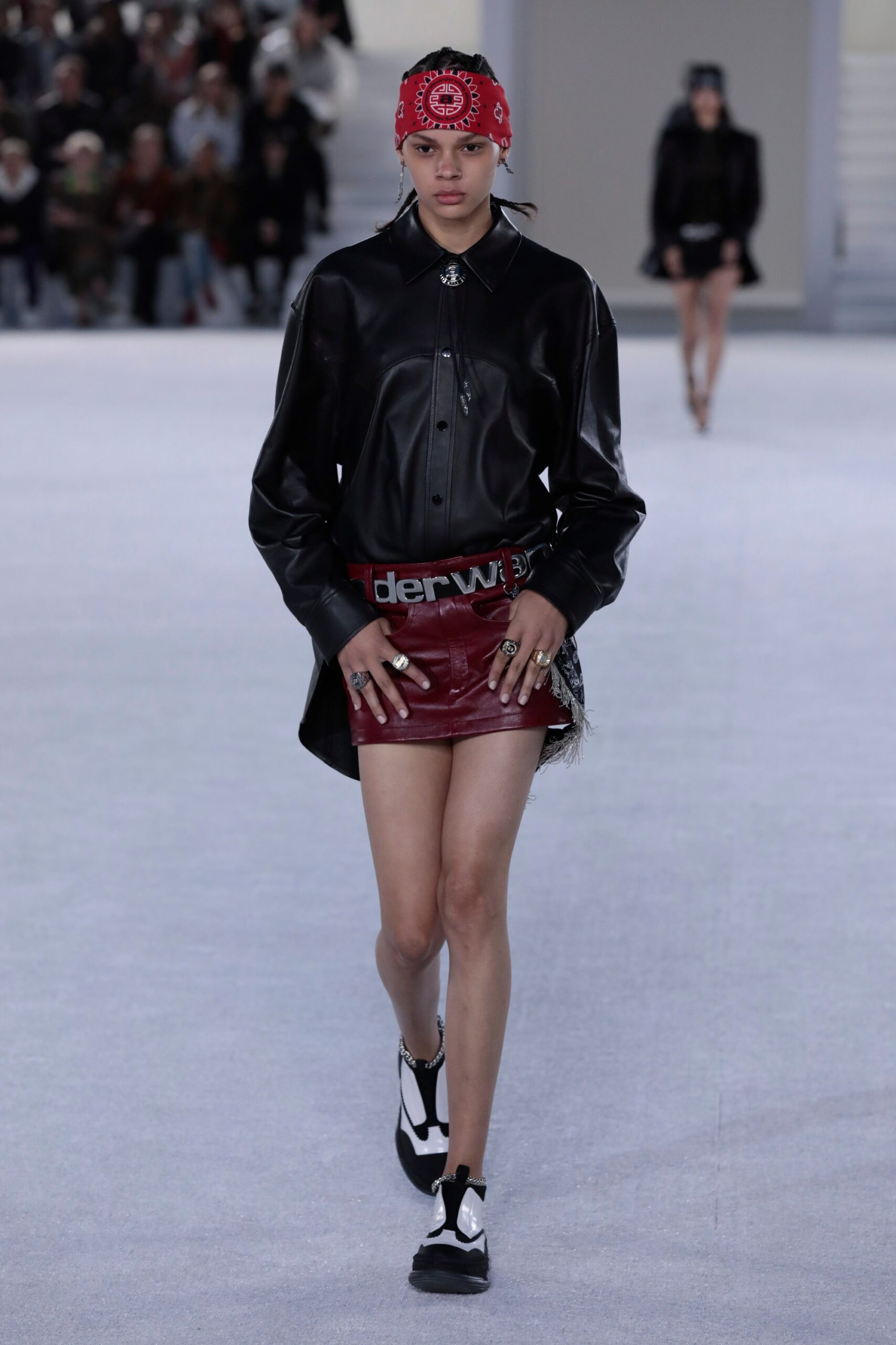 black leather shirt red vinyl skirt