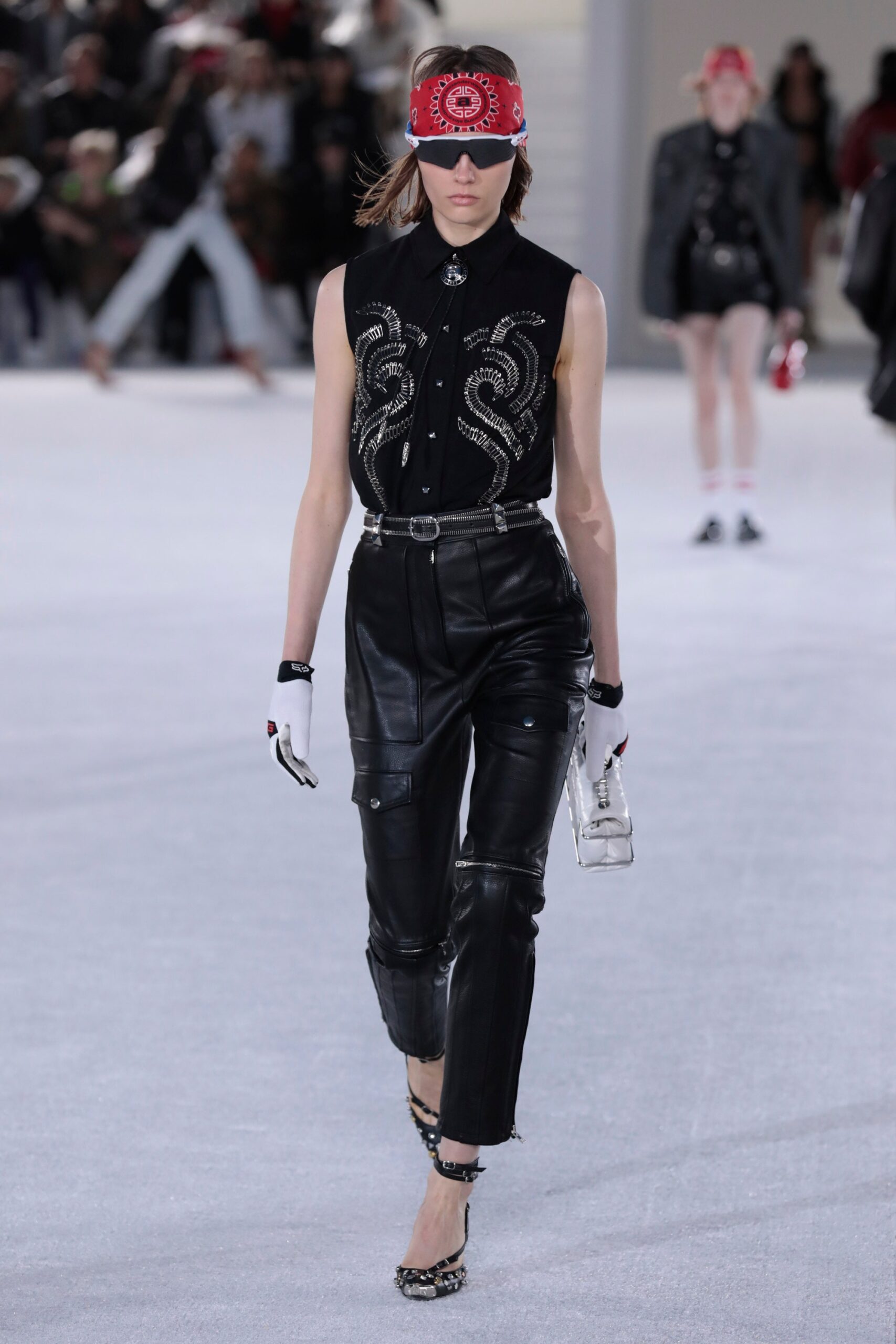 black embroidered shirt and leather pants