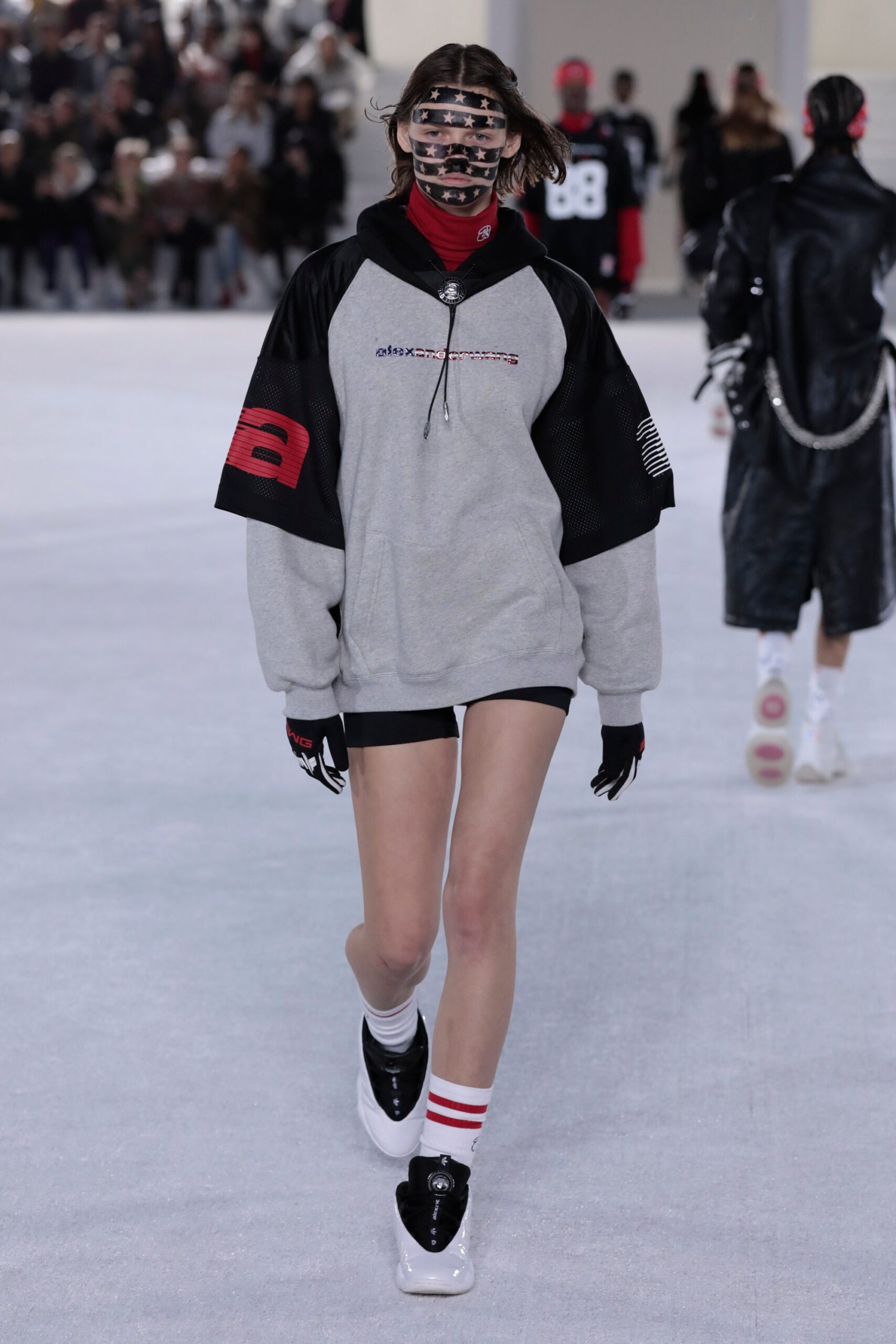 gray oversized hoodie with black shorts