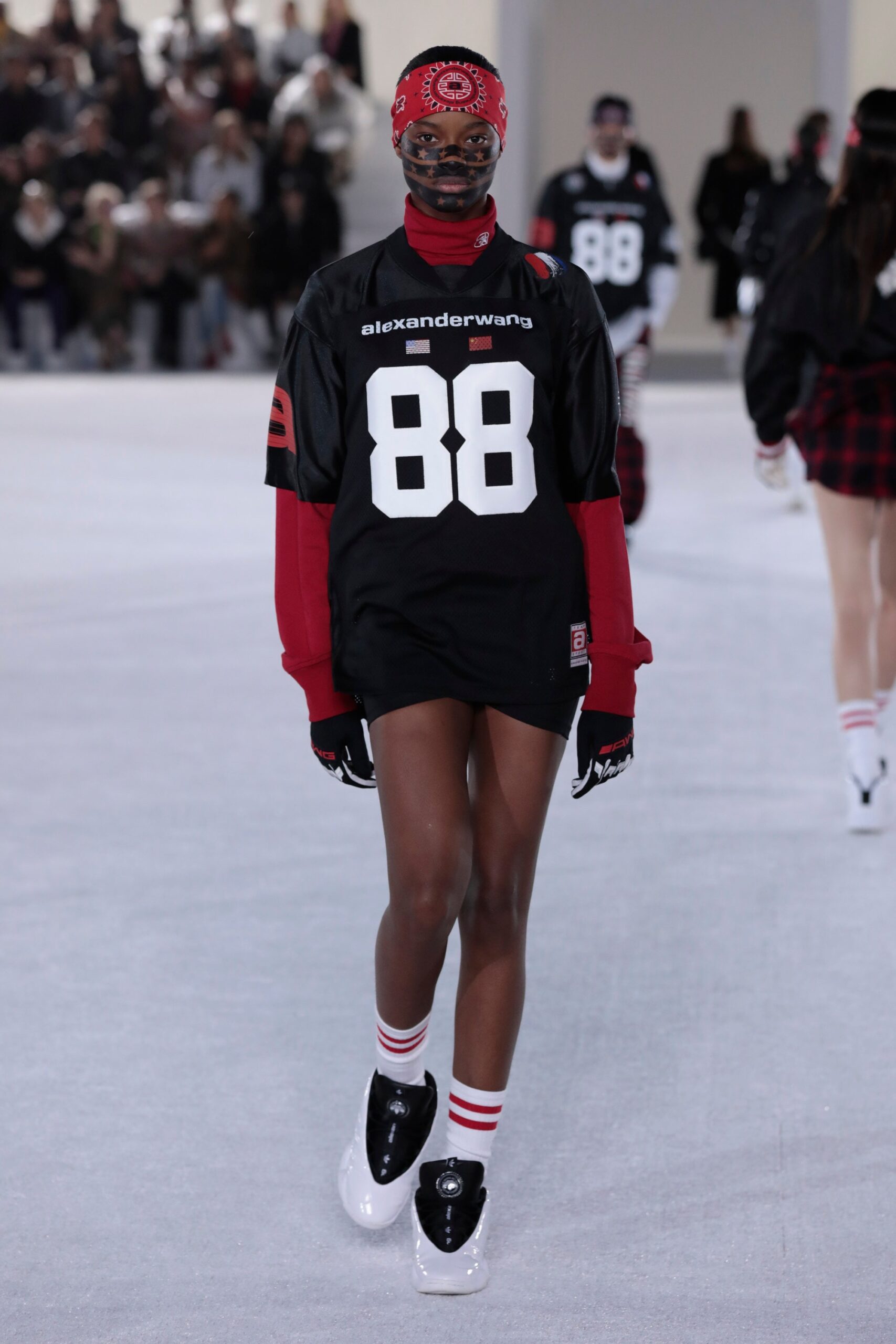 black t-shirt with red sweater