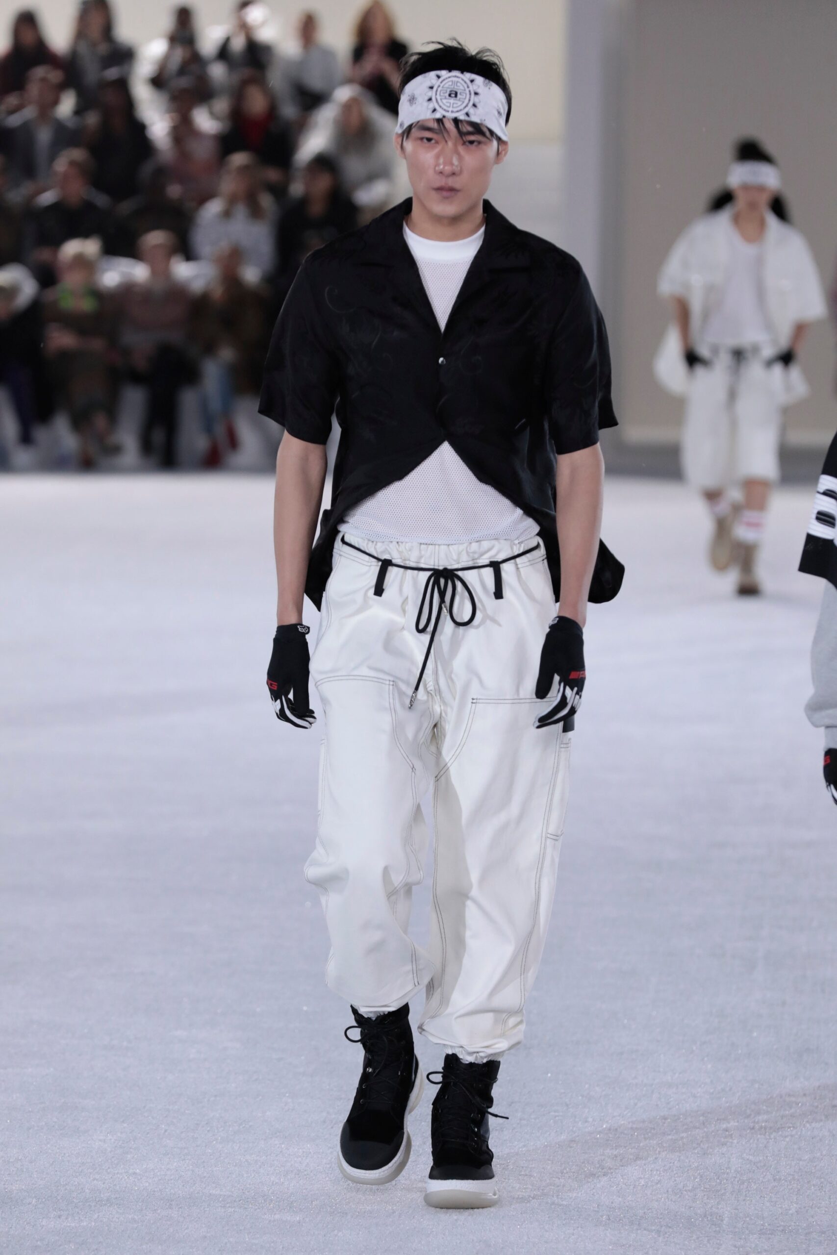 black shirt white pants outfit