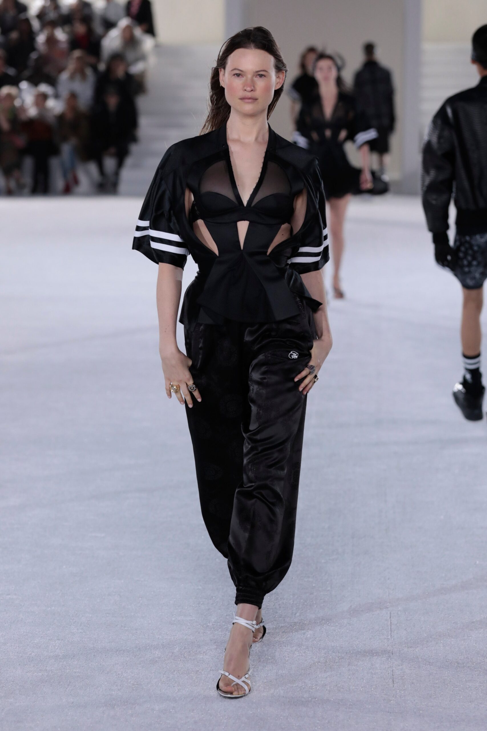 black fitted top and relaxed pants