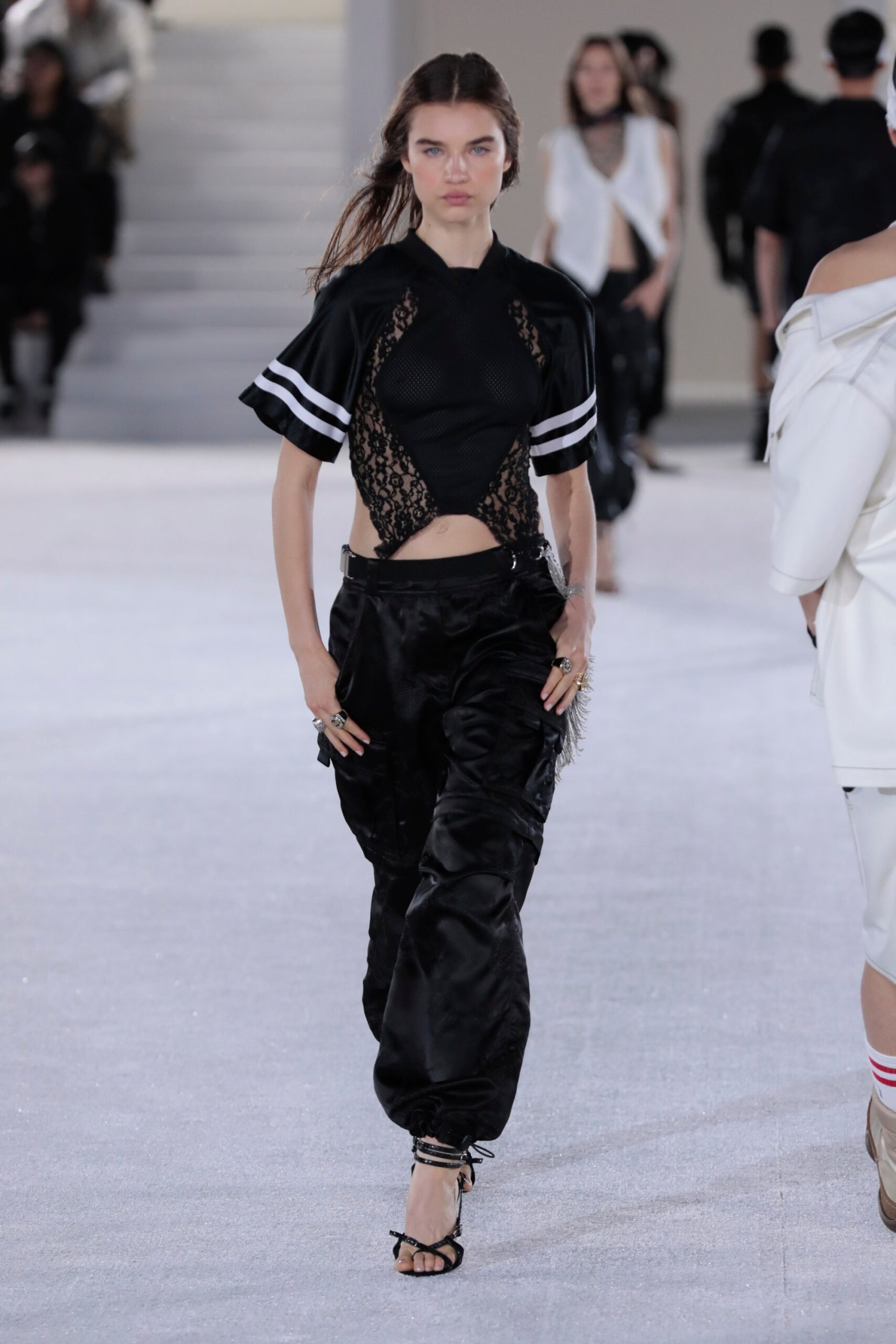 black silk fitted top and relaxed pants