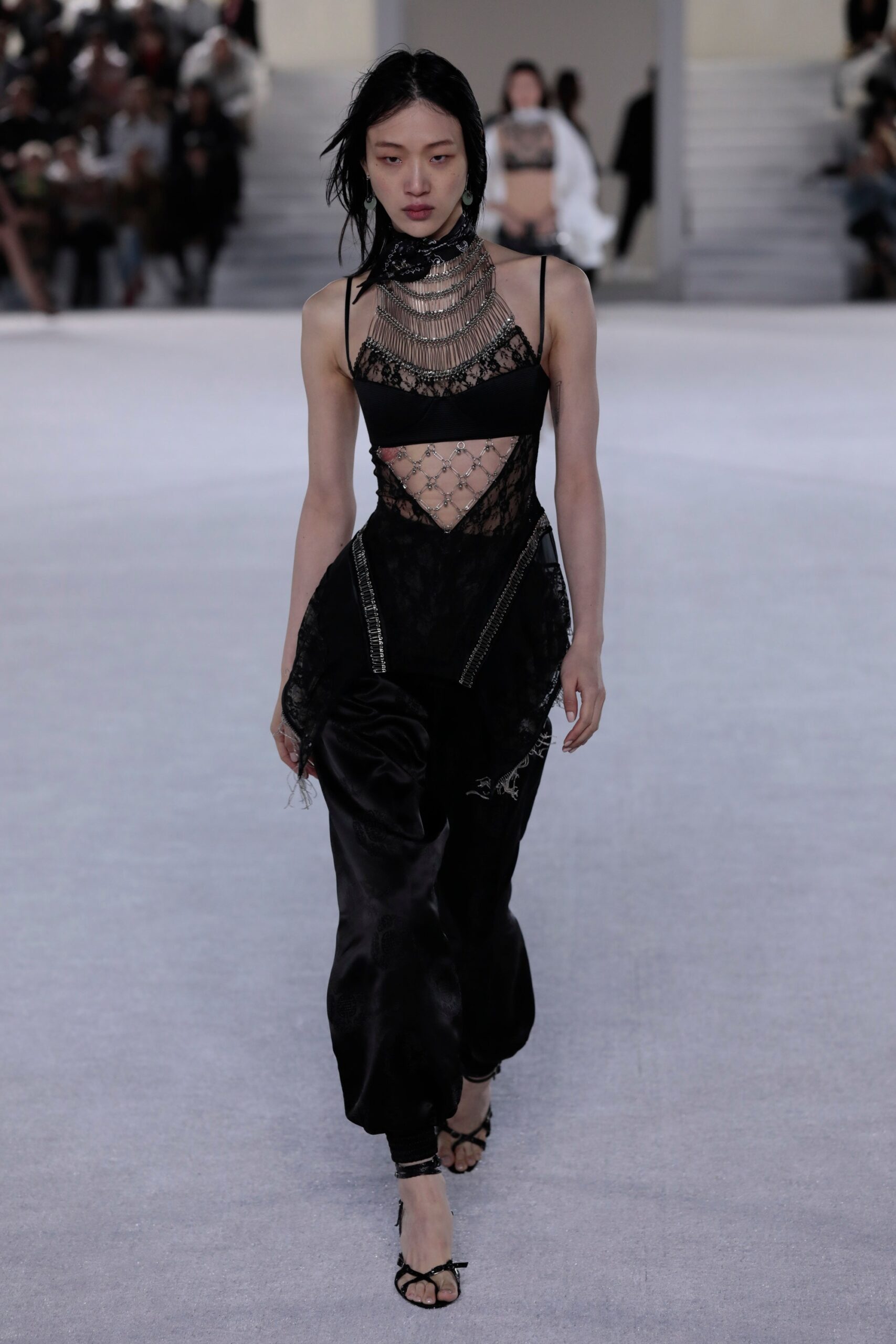black silk fitted top and relaxed pants