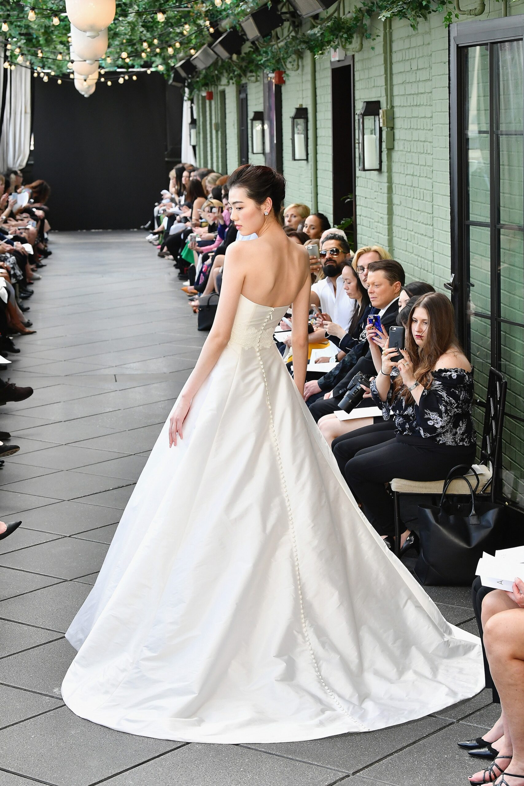 white silk strapless gown