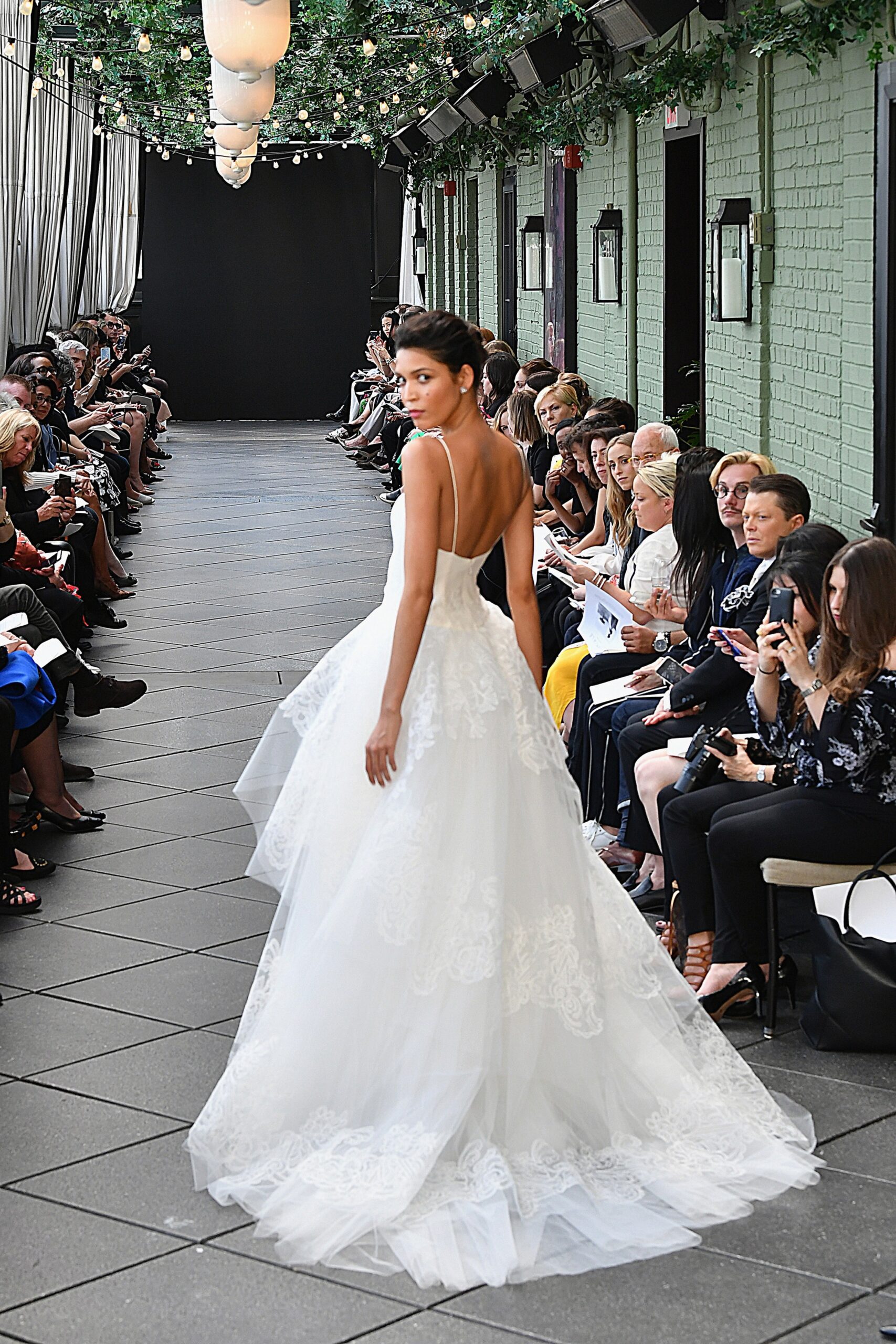 white embroidered sleeveless gown