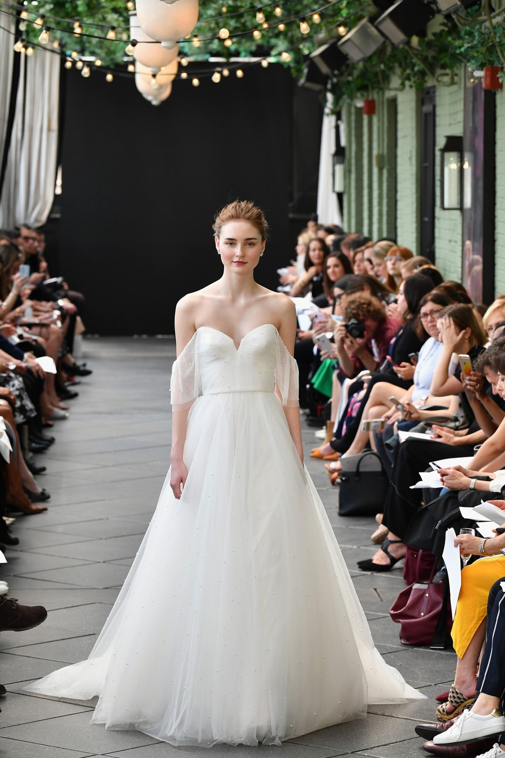 white silk sleeveless gown