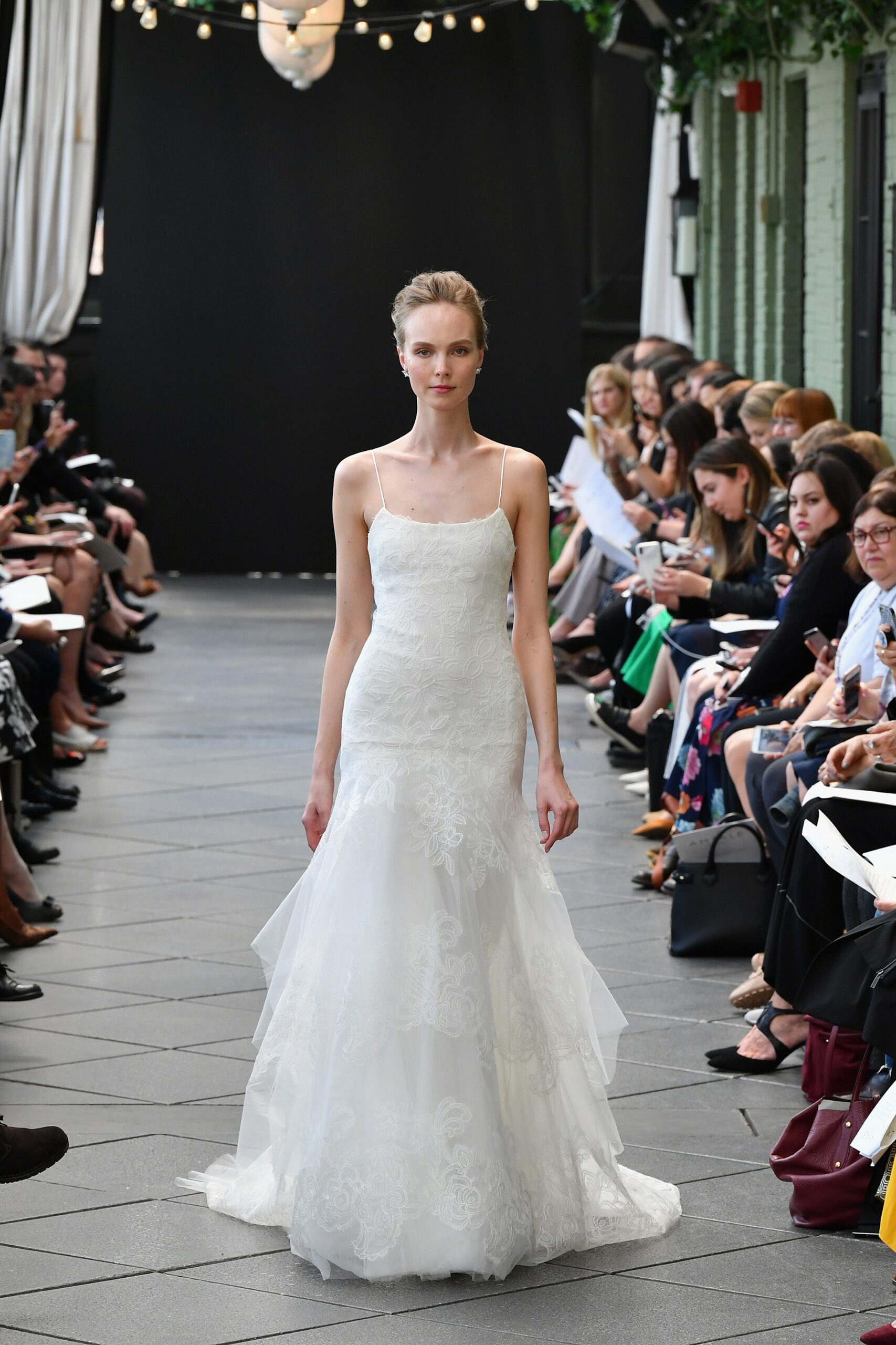 white lace sleeveless gown