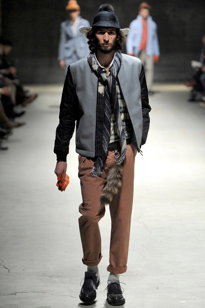 gray relaxed jacket with brown pants
