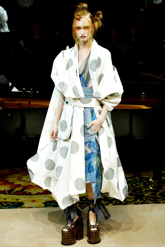 white polka-dot coat and blue dress
