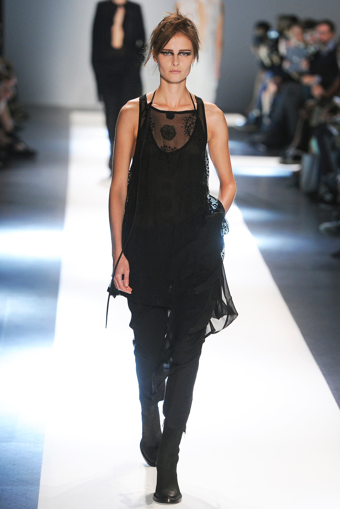 black layered top with fitted pants
