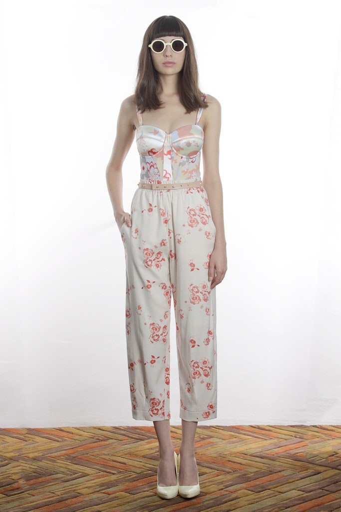 floral white jumpsuit with sunglasses