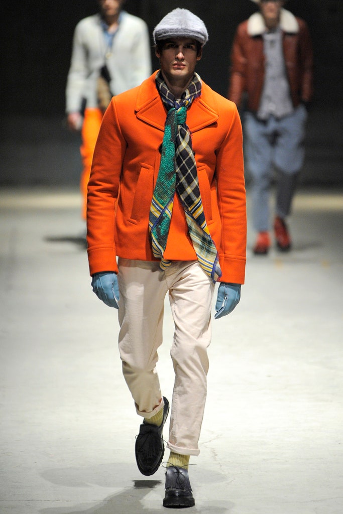 orange wool jacket with plaid scarf