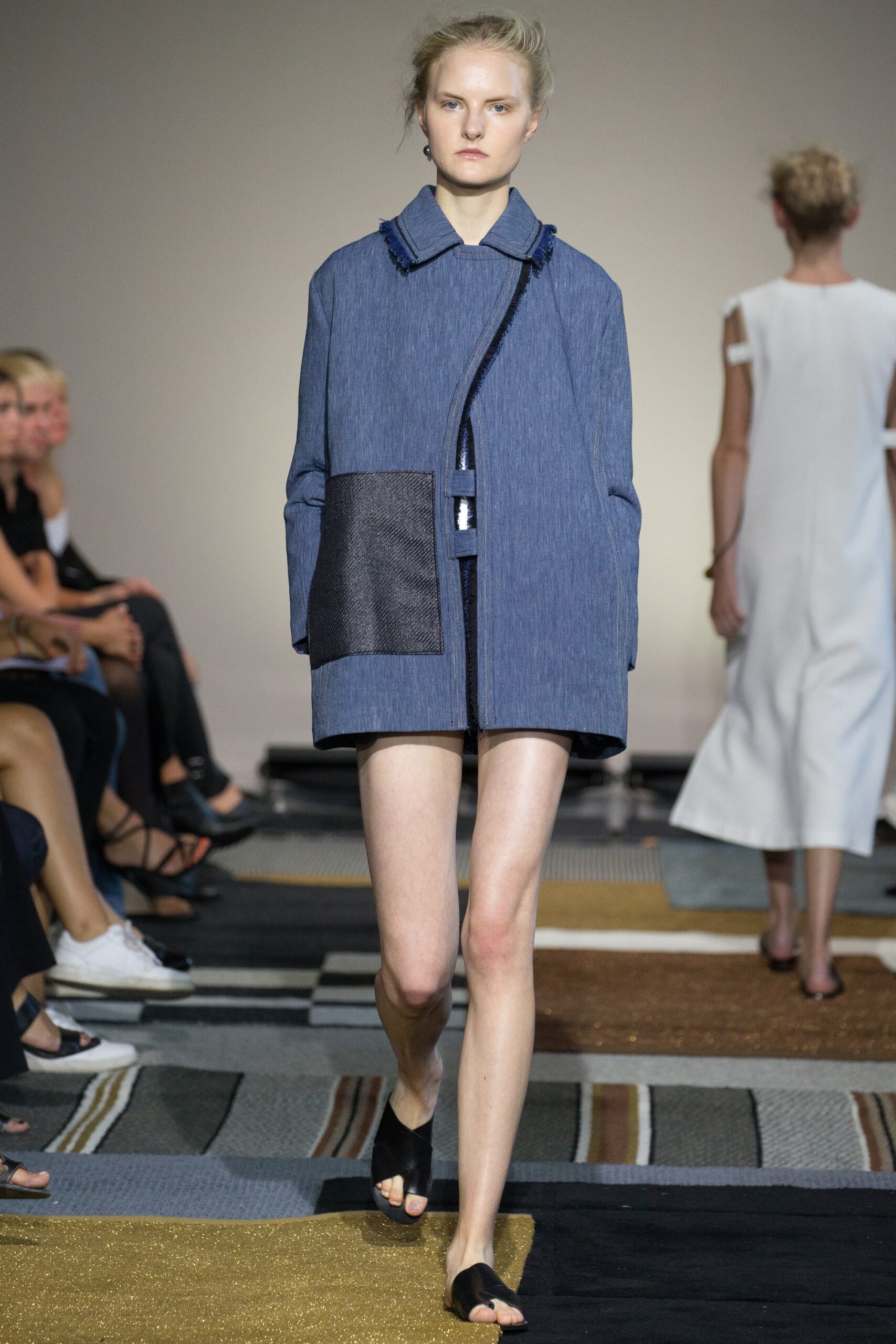 blue denim jacket with black shorts