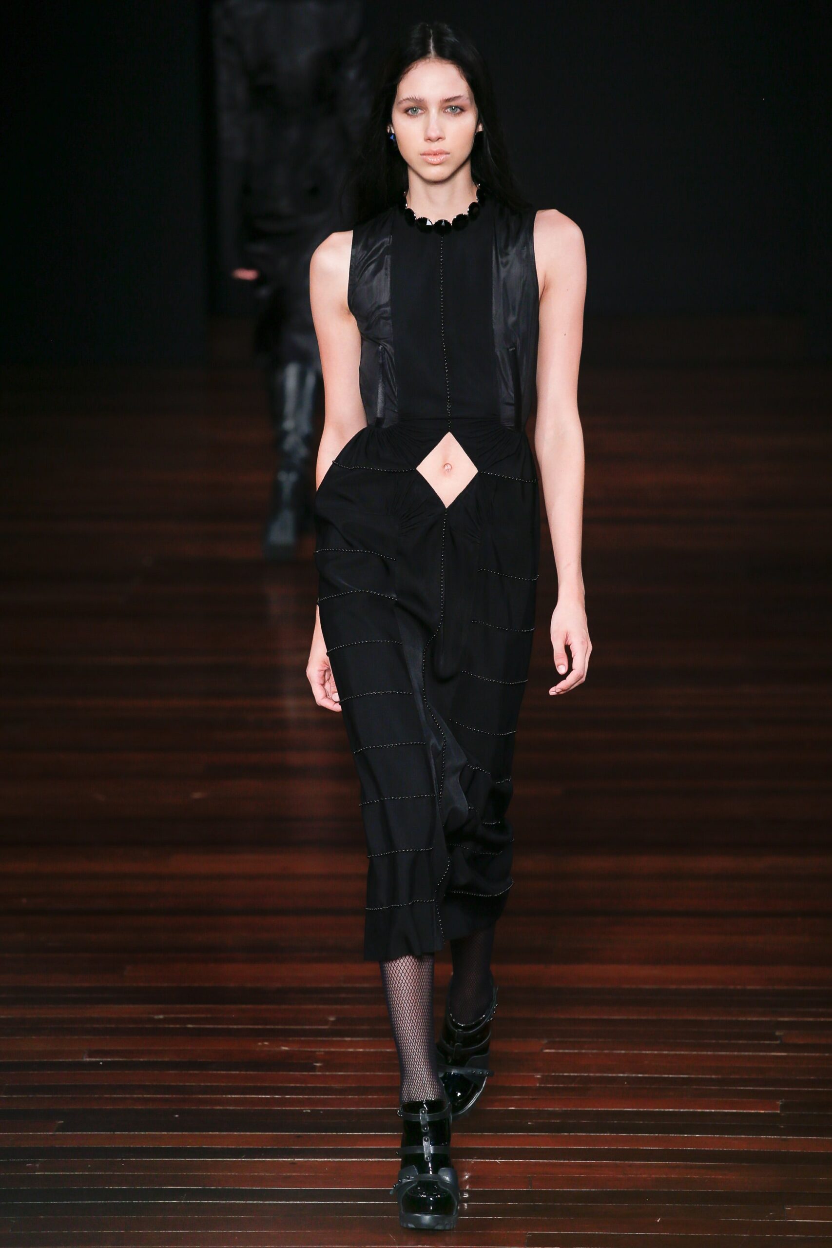 black fitted sleeveless jumpsuit