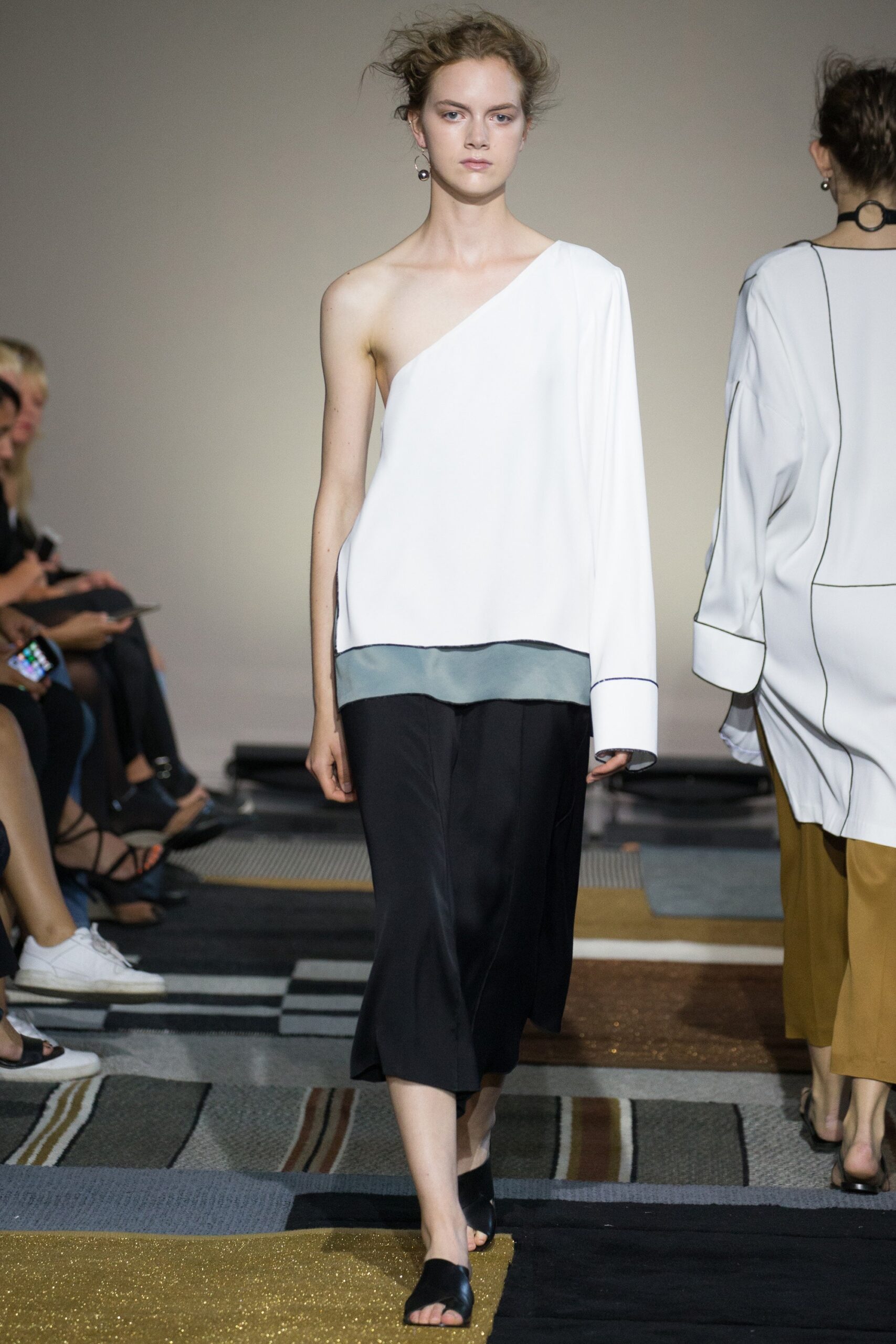 white asymmetric top and black skirt