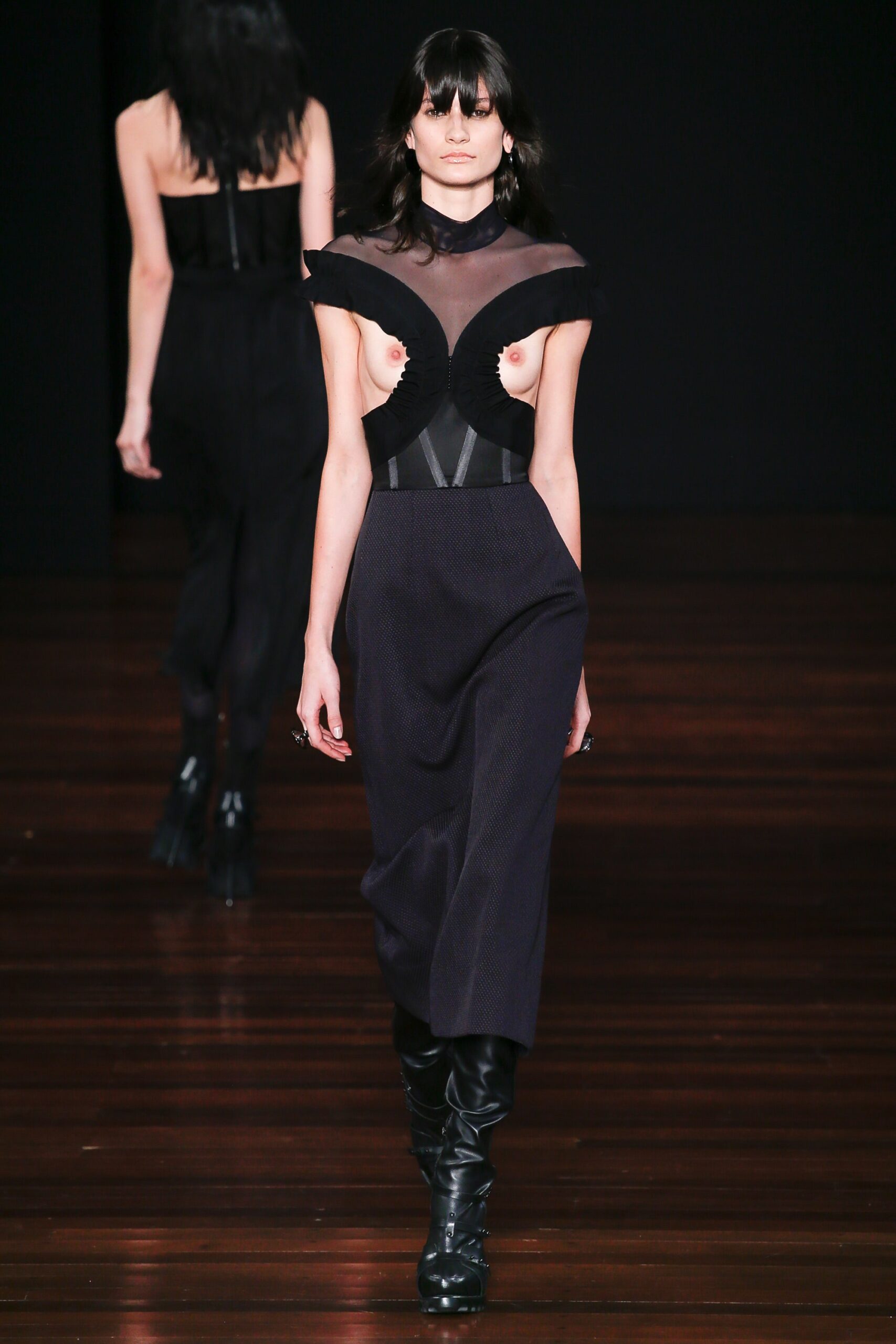 black fitted midi dress with boots