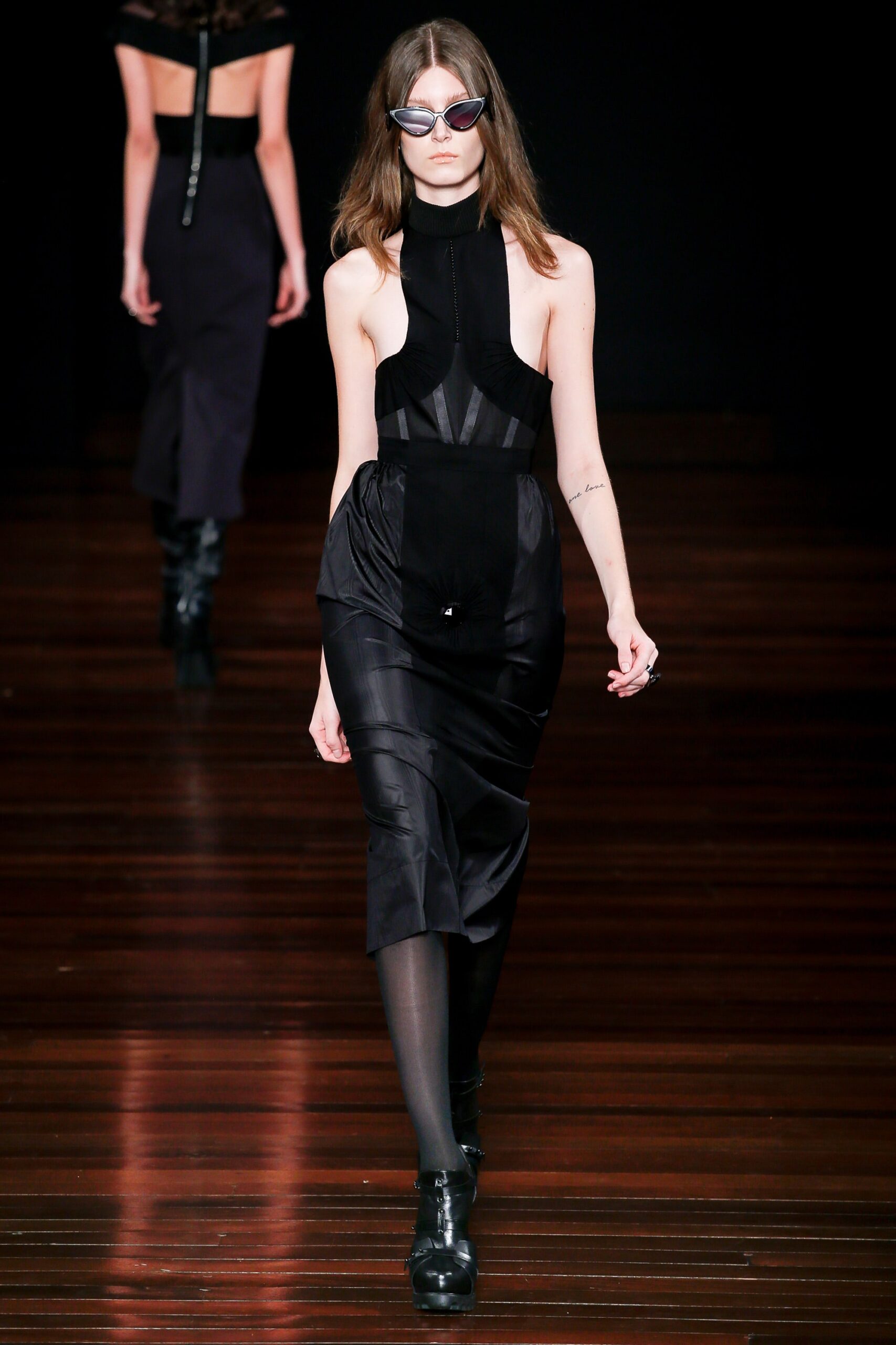 black fitted midi dress with sunglasses