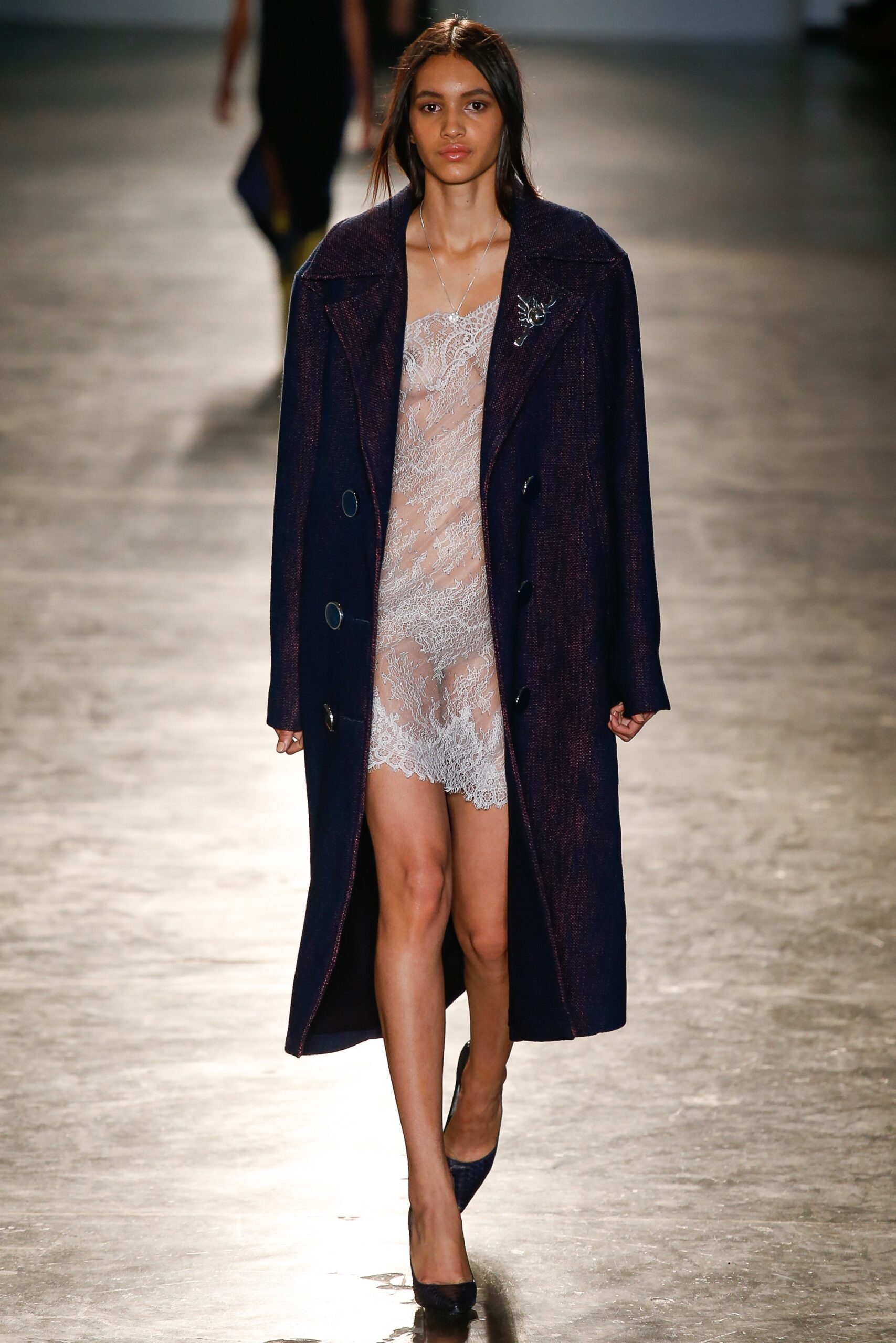 navy coat and white lace dress