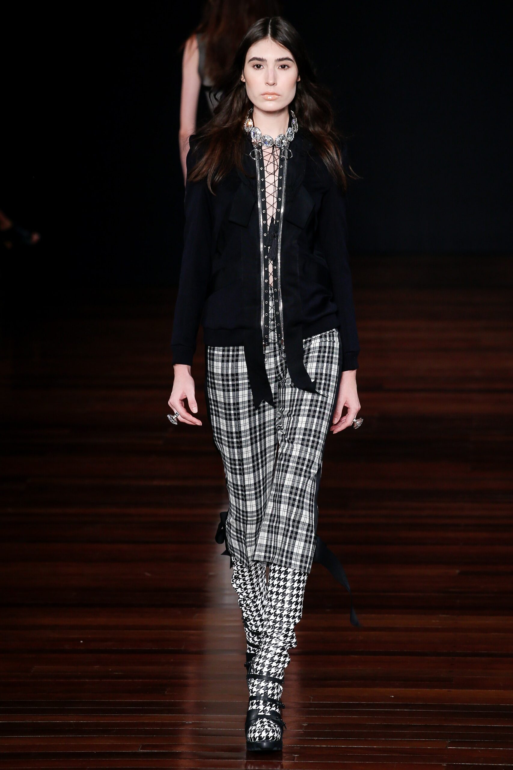 black fitted blouse with checked pants