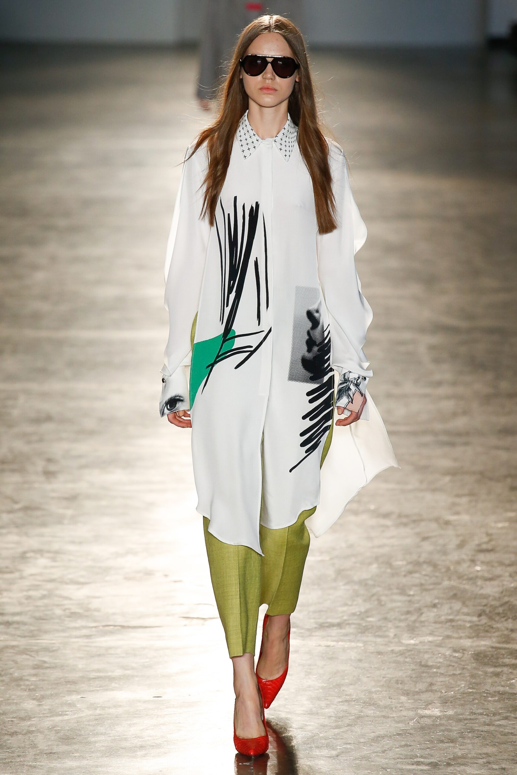 relaxed white printed shirt with tailored green pants