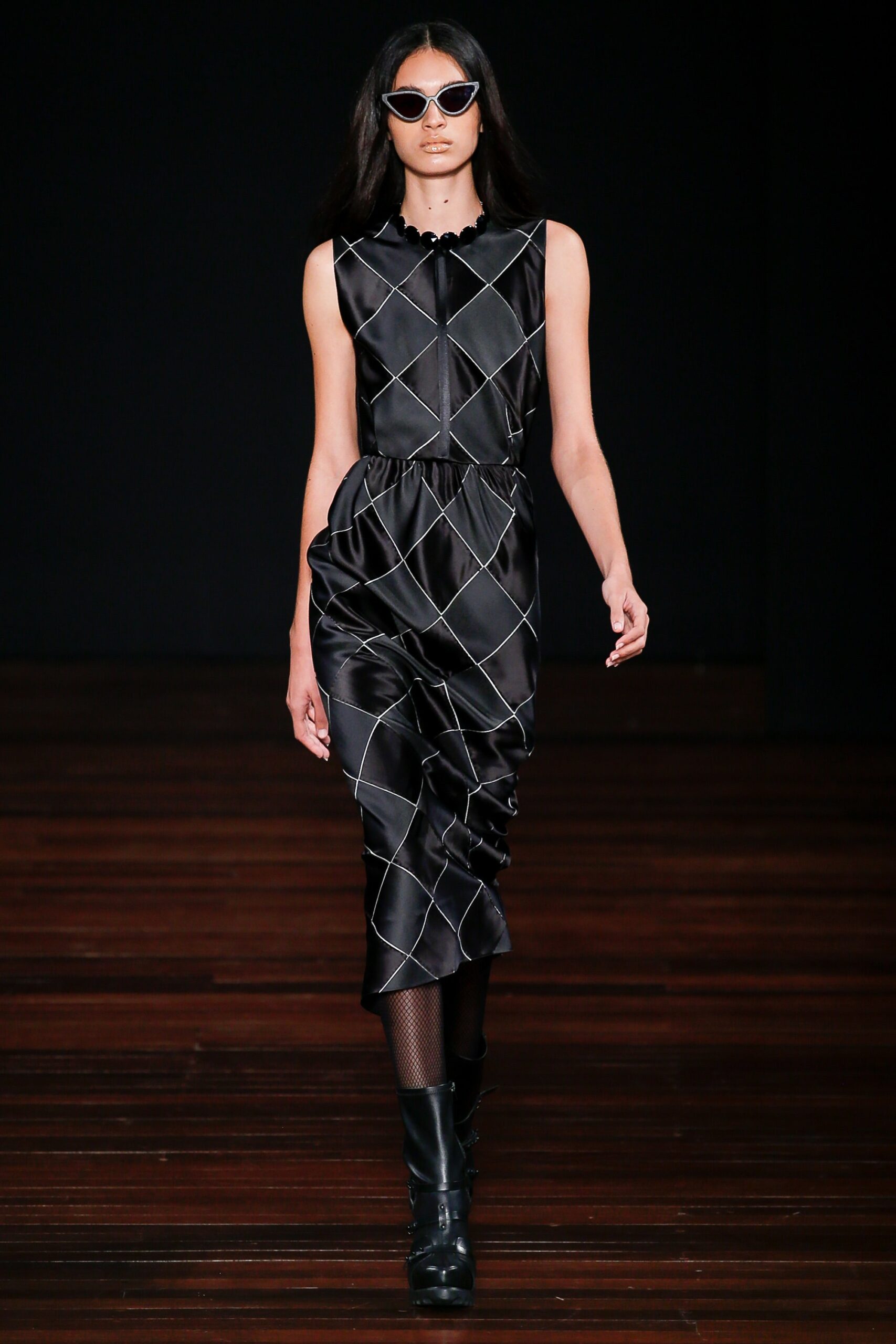 black silk ruched midi dress with sunglasses