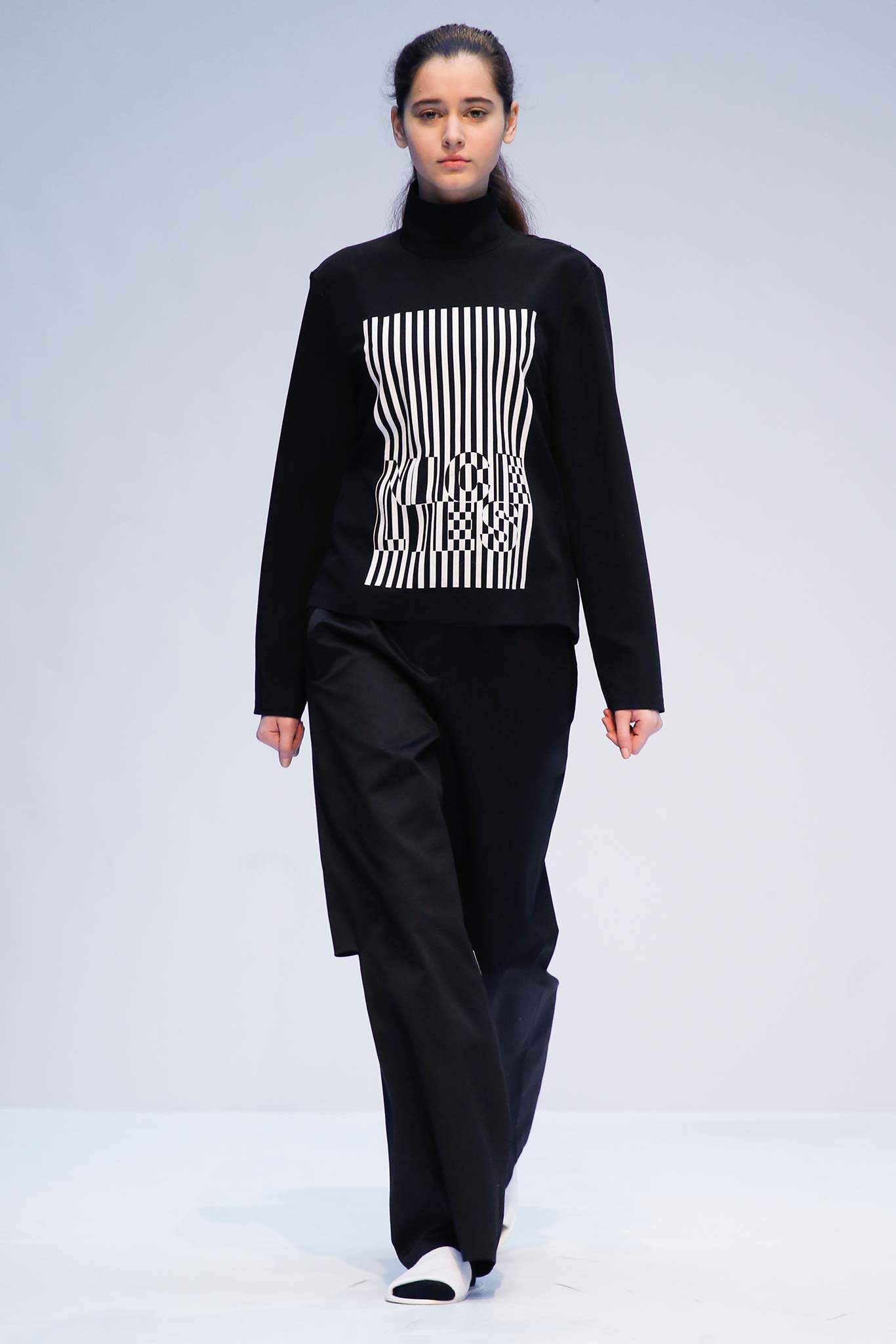 black and white printed top with relaxed pants