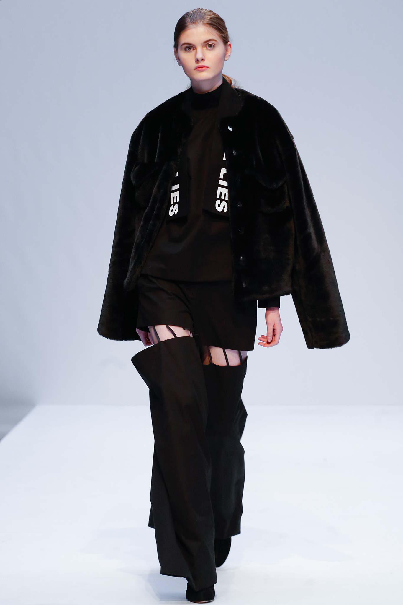 black oversized faux-fur coat
