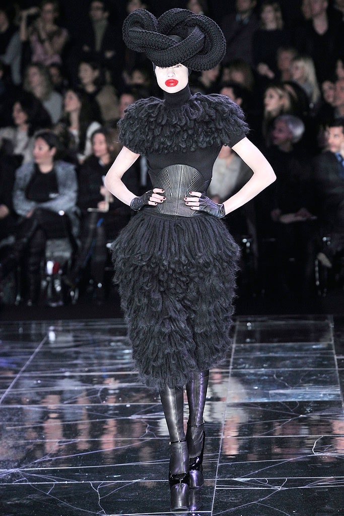 black ruffled midi dress with boots