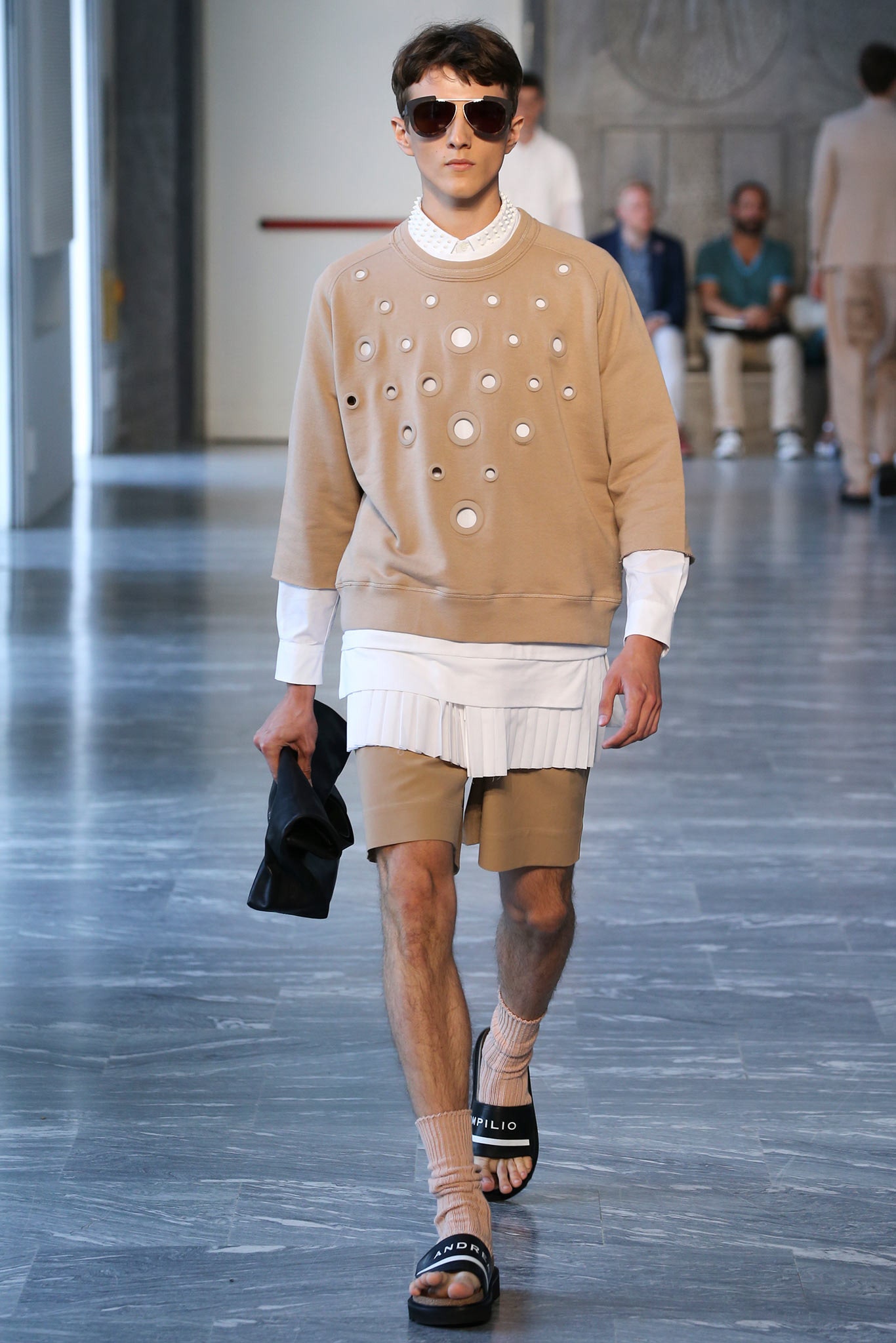 beige relaxed sweater with layered shirt