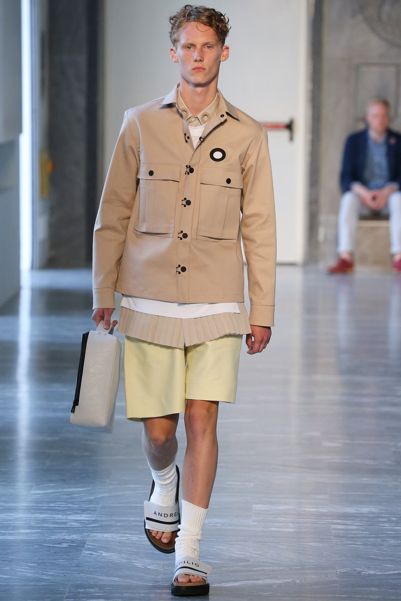 beige jacket with yellow shorts