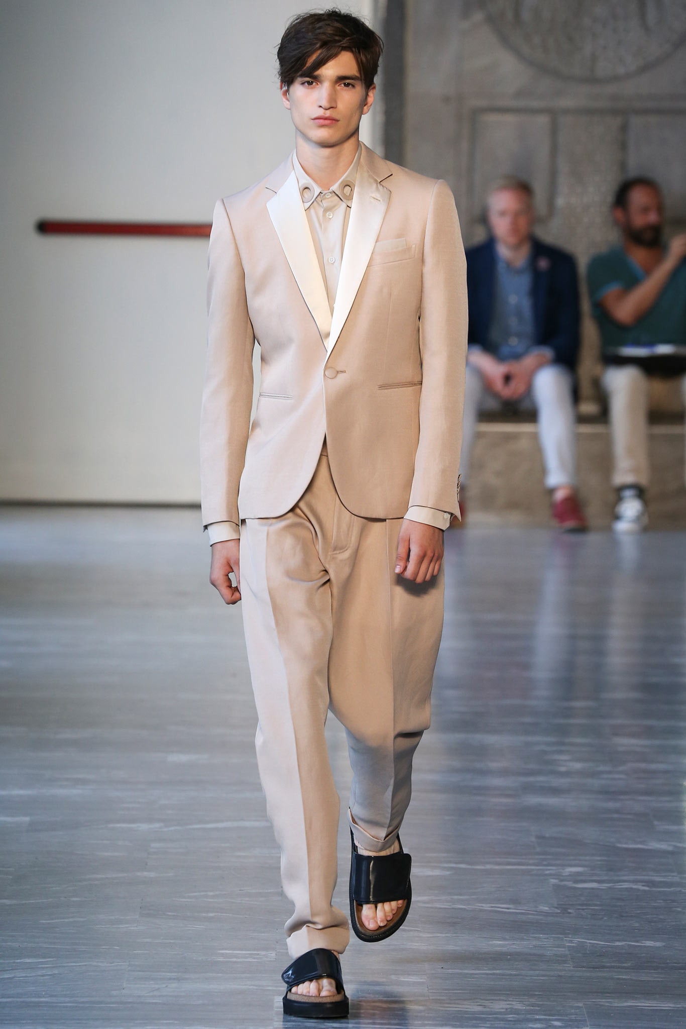 beige tailored suit with relaxed pants