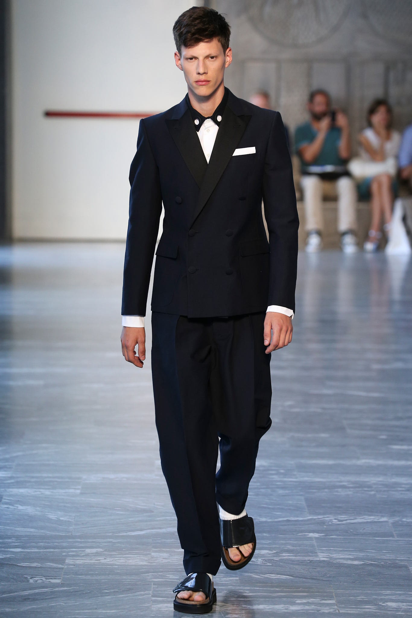 black tailored suit with relaxed pants