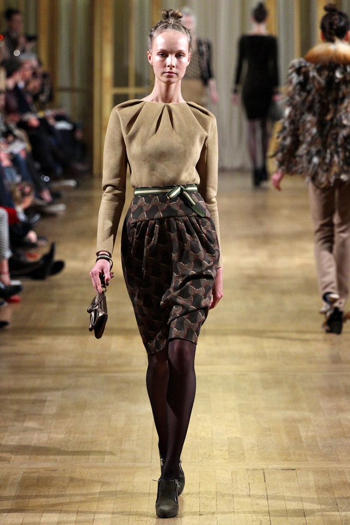 beige fitted top with multi skirt