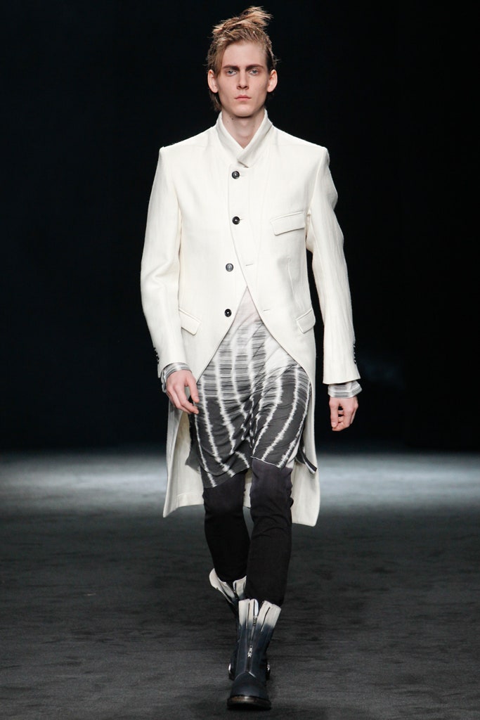 white coat gray dress black pants